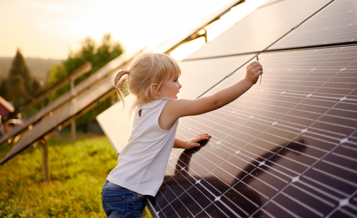solar power system with girl playing near it